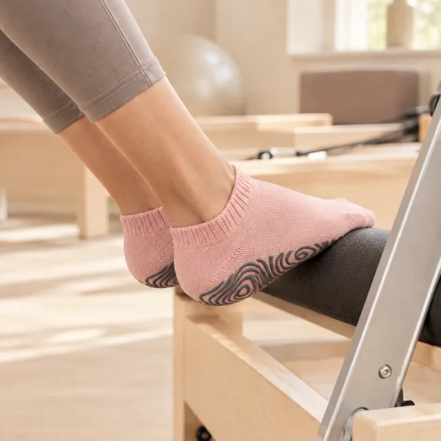 Contour Ankle Grip Socks in the studio