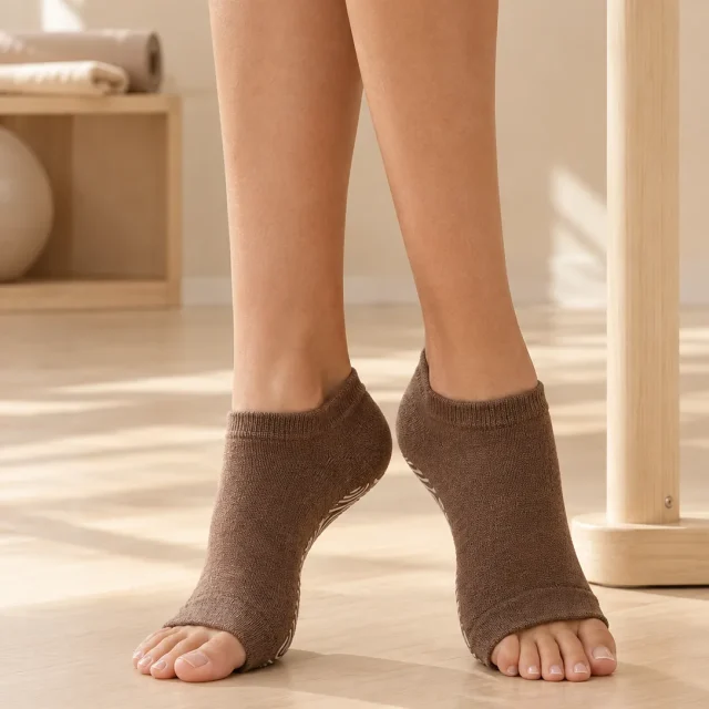 Contour Toeless Grip Socks in the studio